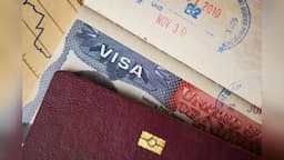 For a visa photograph: “Close-up of a US visa page in a passport.” Adjust to match the actual image.