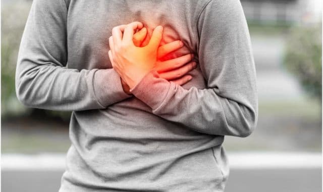 Picture depicts a man having heart attack.
