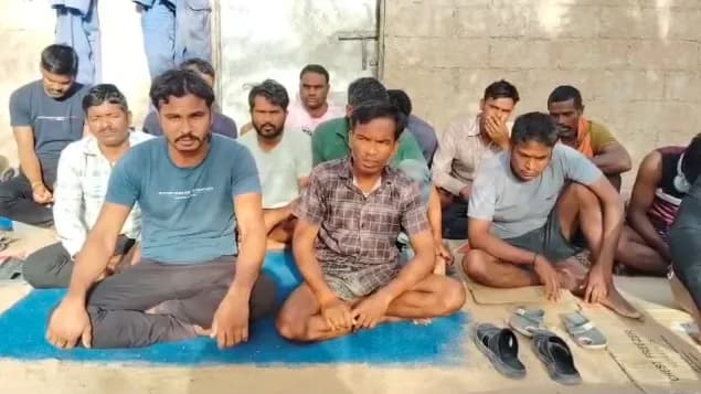 a group of Indian migrant workers