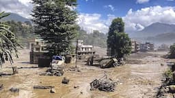 Flash flood devastation in Nepal near the Tibet border as rescue teams search for missing Indian tourists and other victims